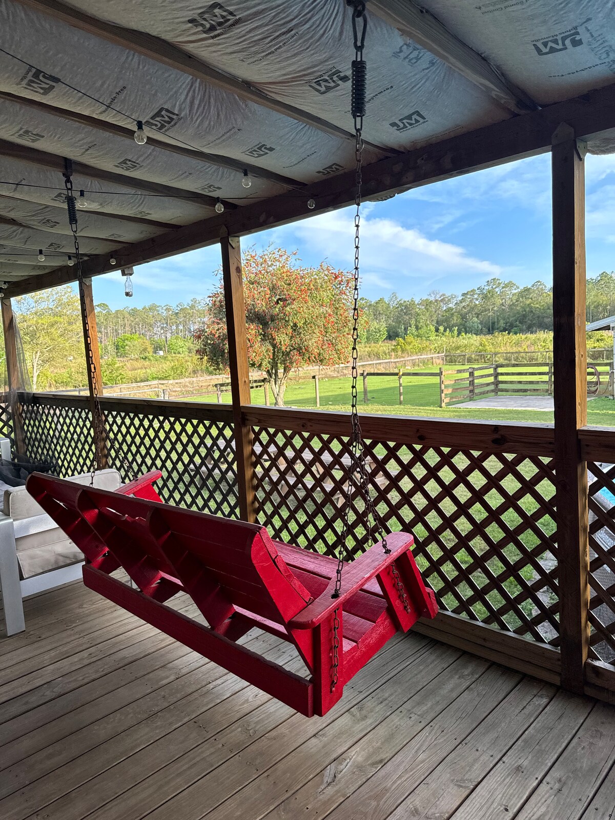 A sunlit view of the ranch property